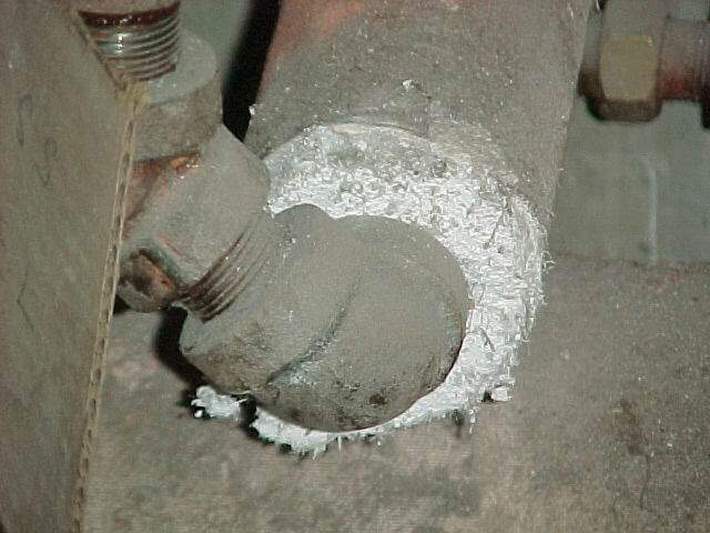 Pipe with asbestos insulation